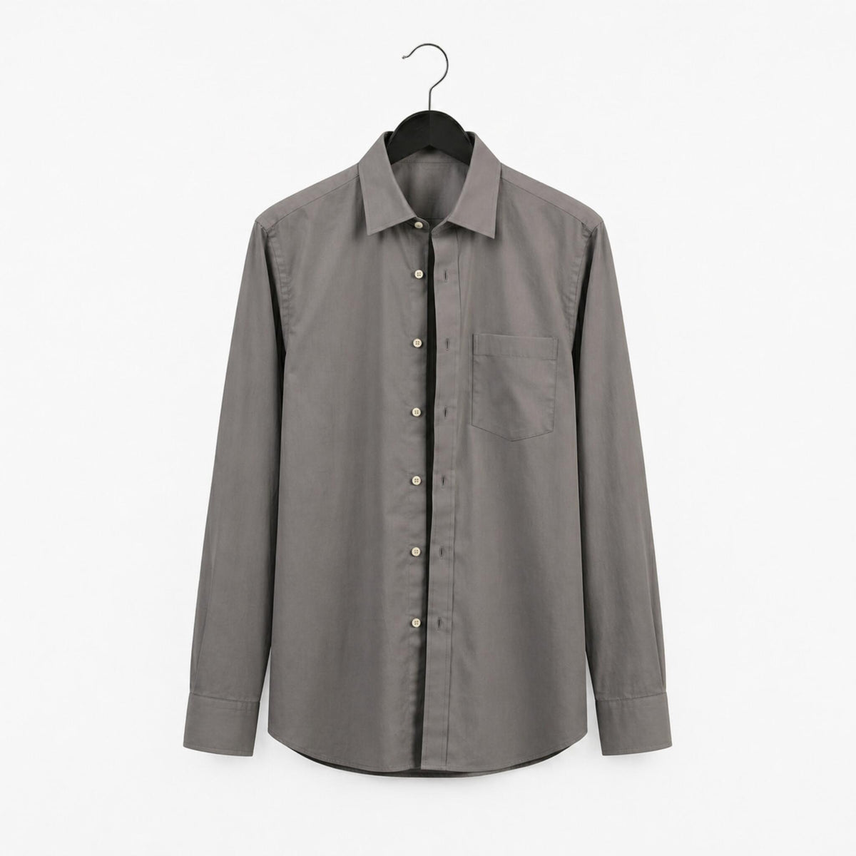 Gray shirt on a hanger against a white background