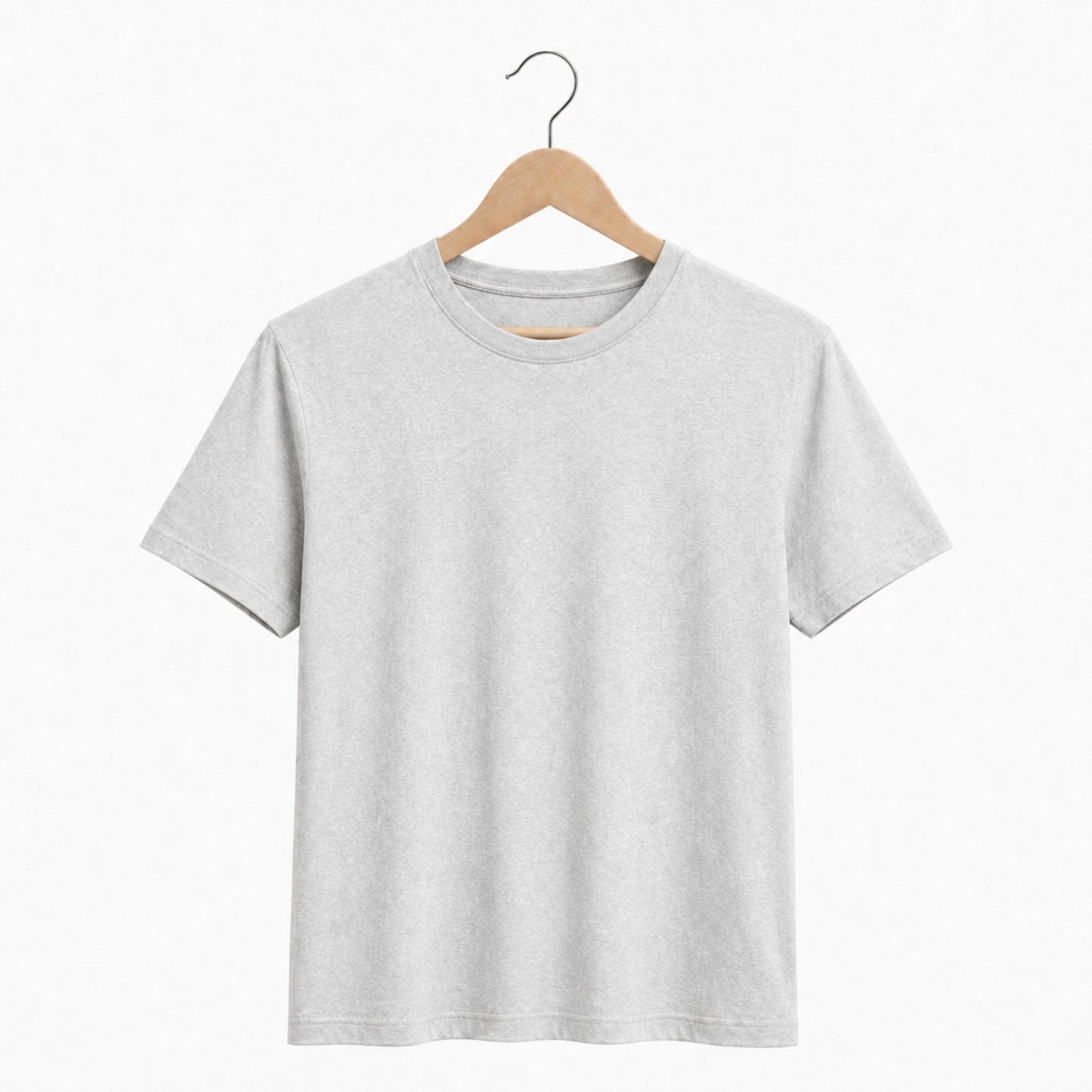 Gray t-shirt on a wooden hanger against a white background