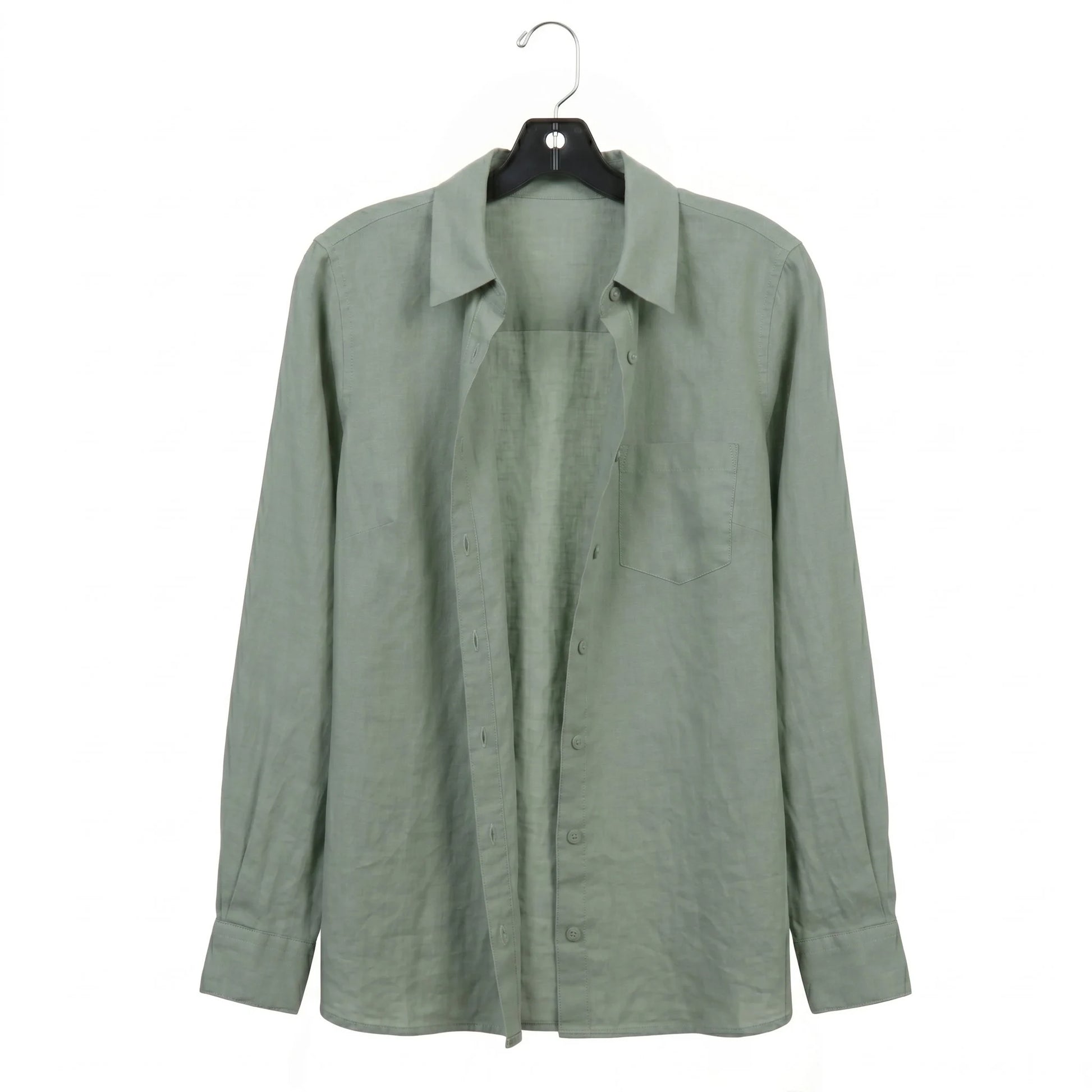 Green shirt on a hanger against a white background