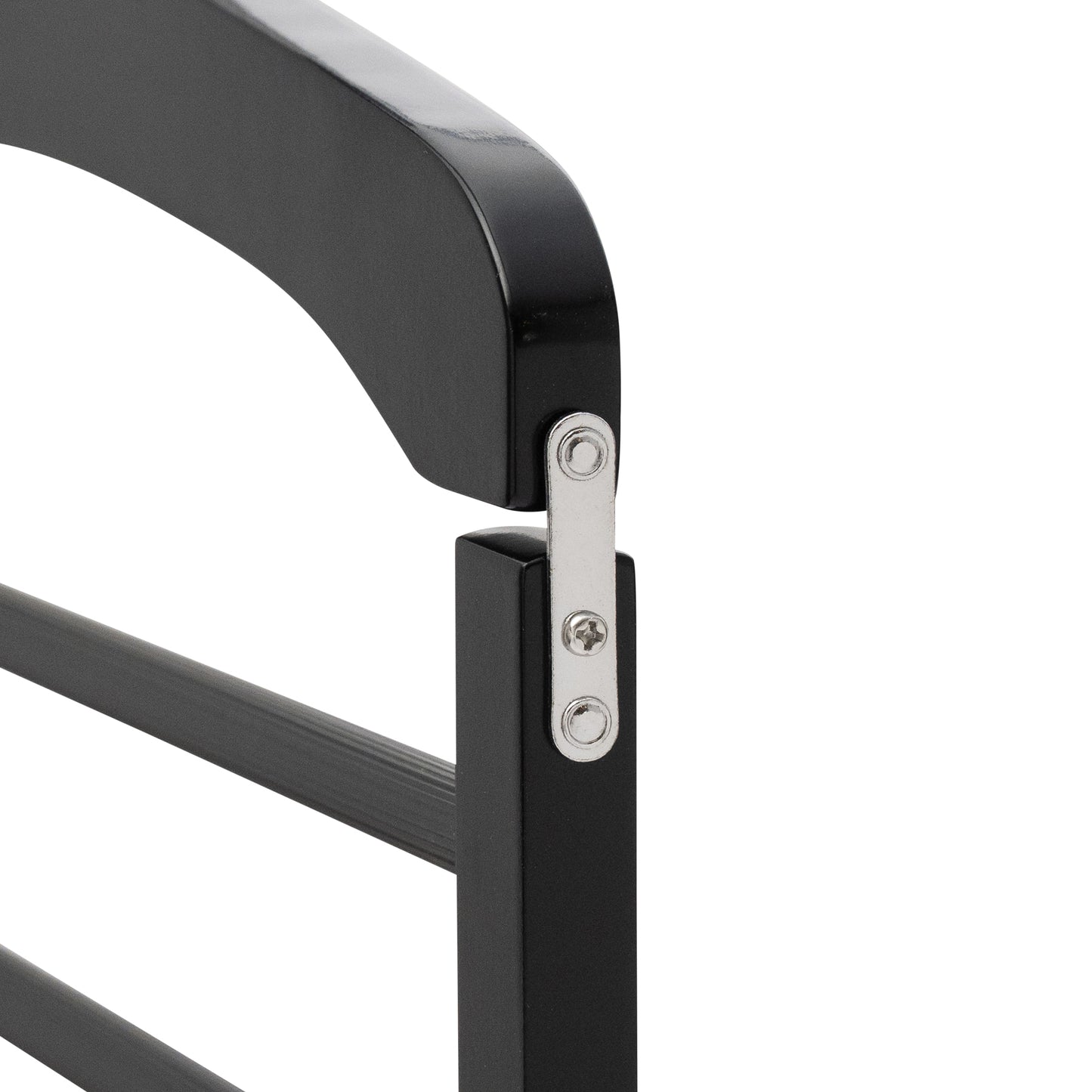 Close-up of a black metal chair armrest with a white background