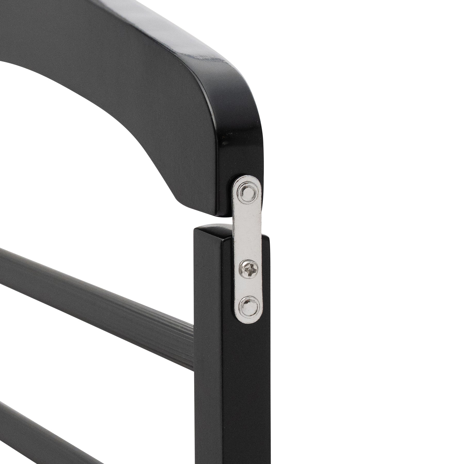 Close-up of a black metal chair armrest with a white background