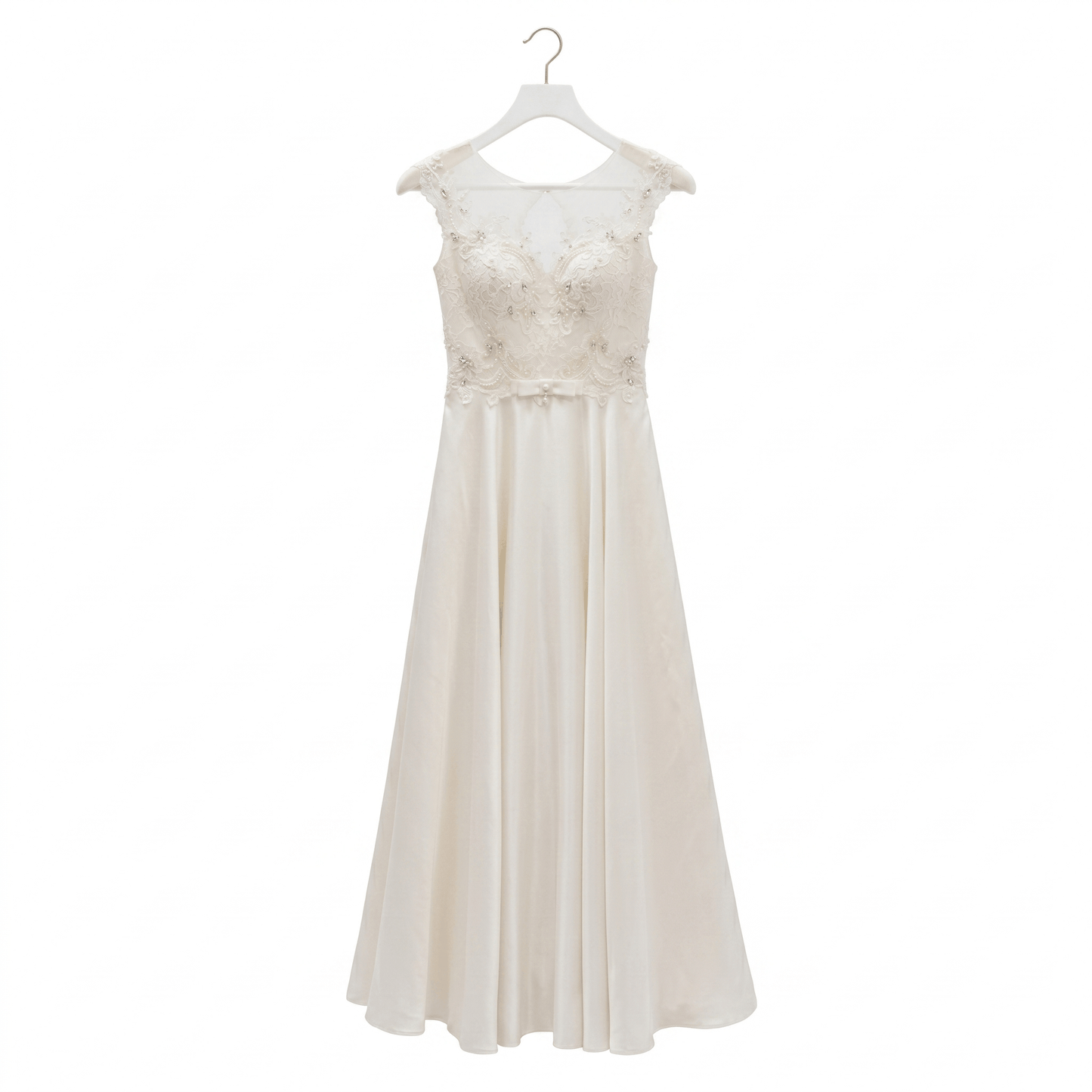 White lace dress on a hanger against a white background