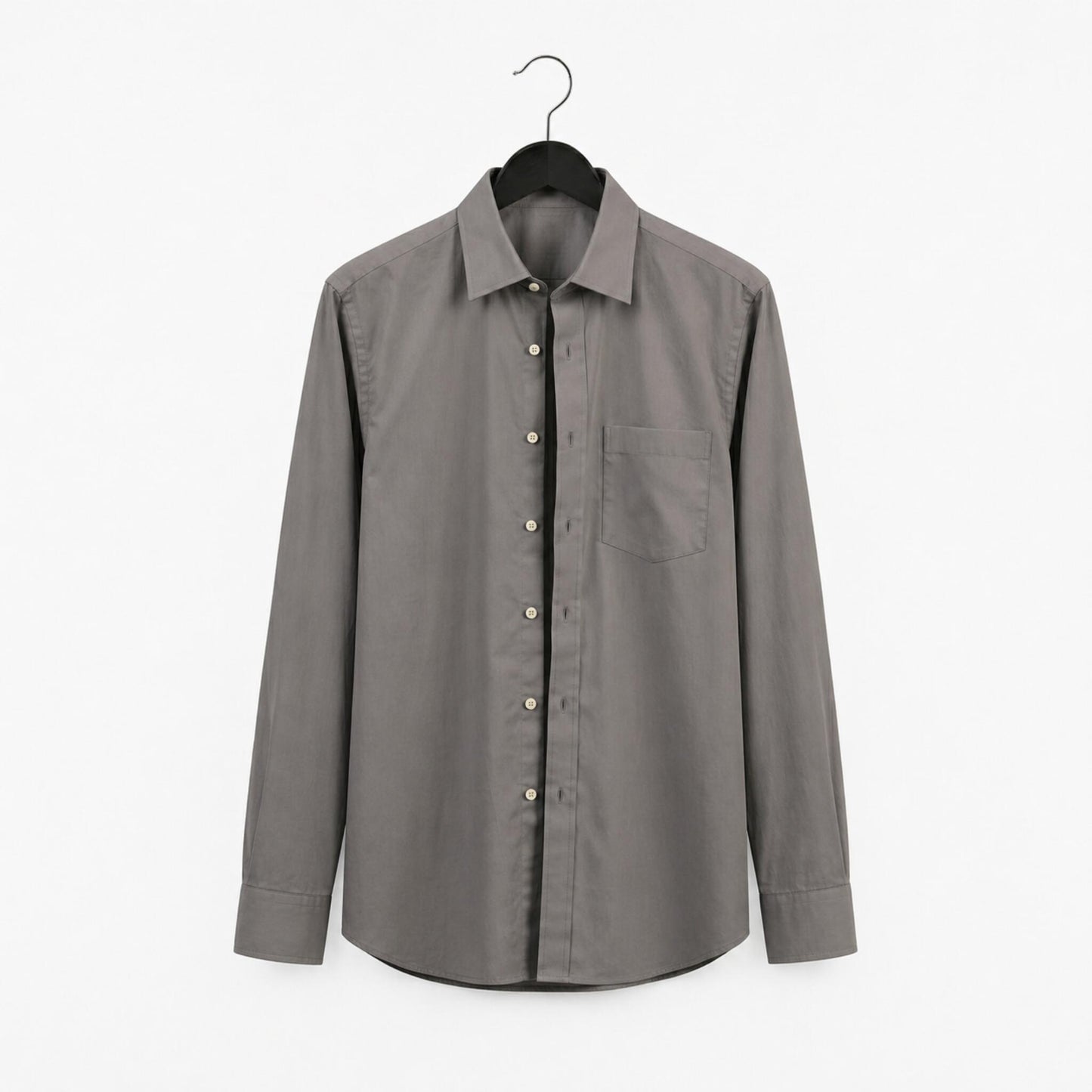 Gray shirt on a hanger against a white background